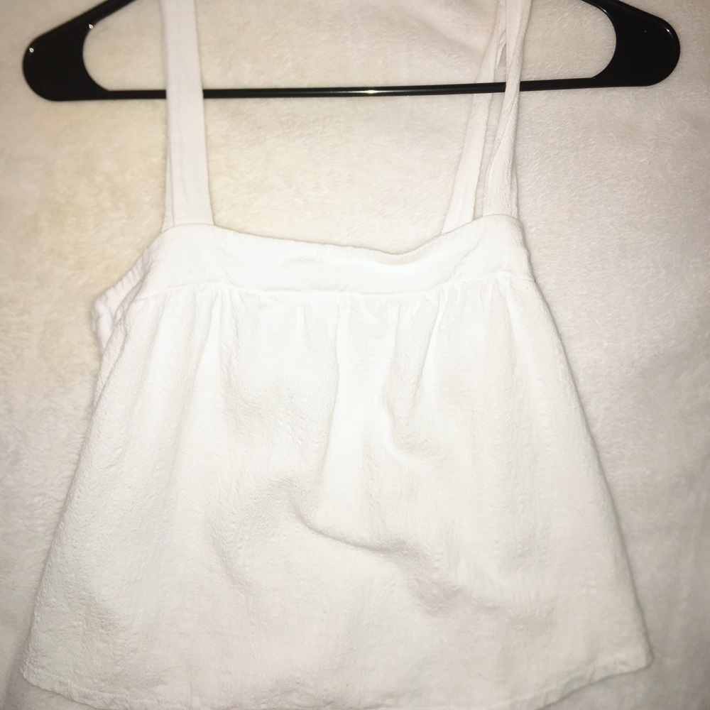 White flowy tank.